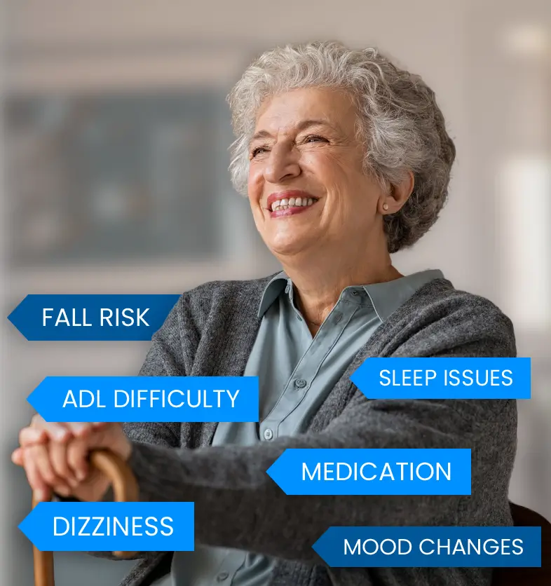 An elderly woman smiling warmly with a caregiver in a home setting